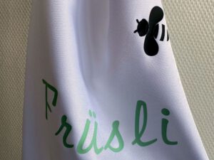 Küchenschürze mit der Aufschrift "Früsli"